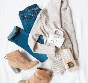 gray cardigan, blue jeans, and pair of brown chunky heeled shoes