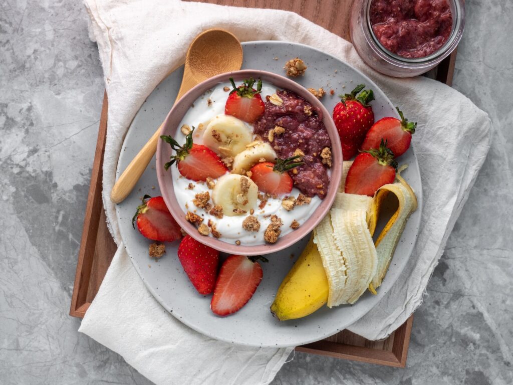 sliced fruits on white ceramic plate