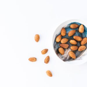 brown and white round medication pill on white ceramic bowl