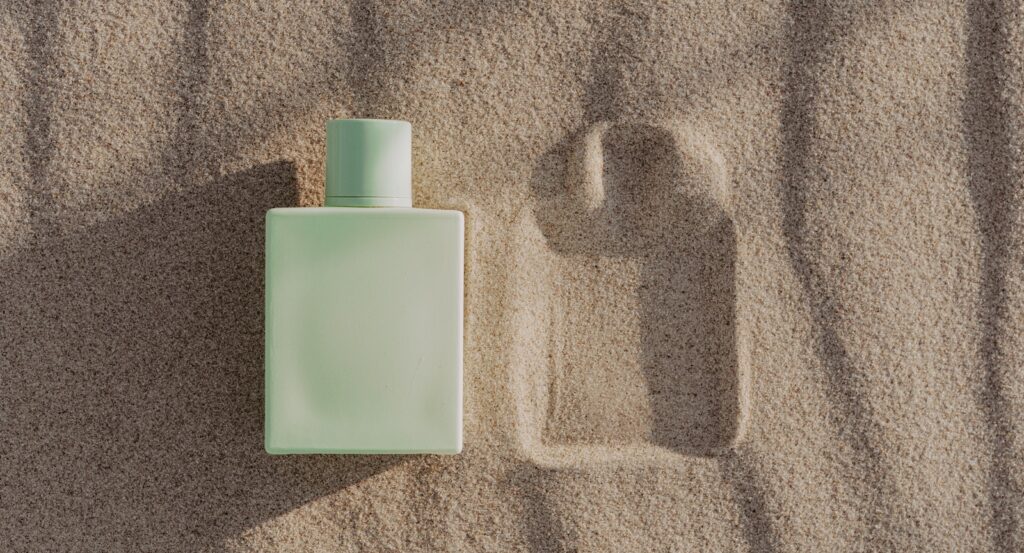 A Perfume Bottle on the Sand