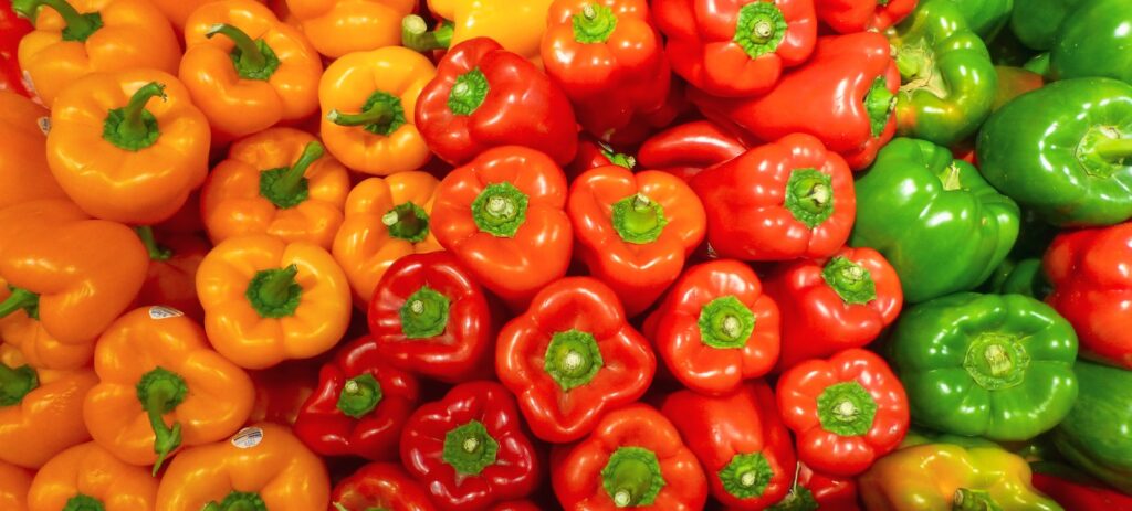 orange bell peppers on white ceramic plate