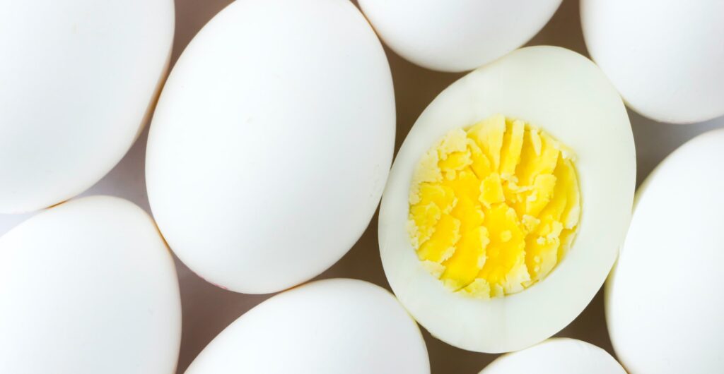 white egg lot on brown wooden table