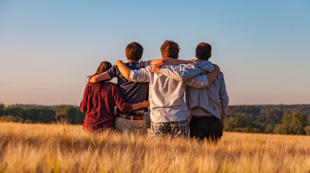 unknown persons standing outdoors