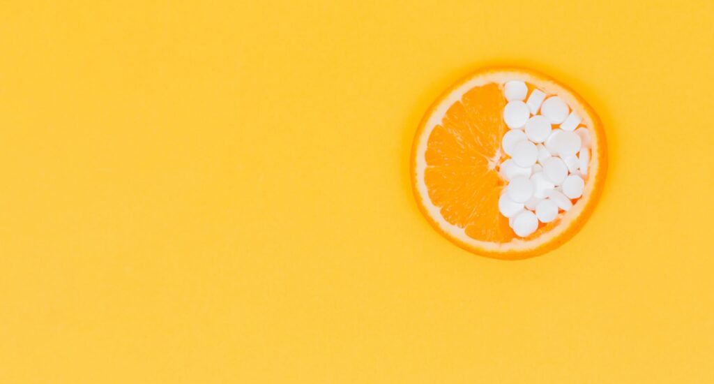 orange fruit with white round fruits