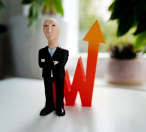 man in black suit jacket and black pants figurine