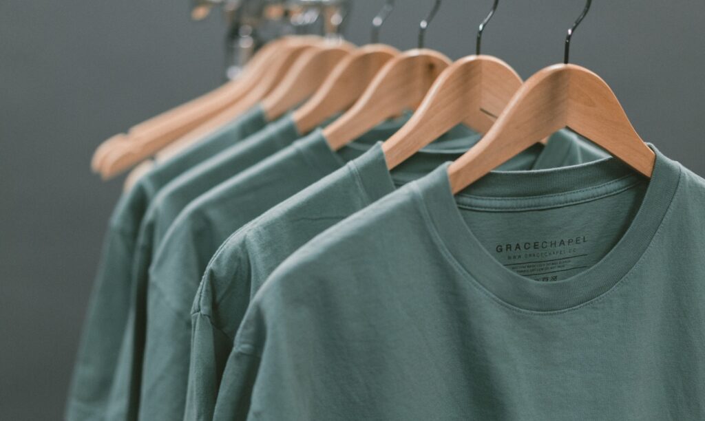 photo of blue crew-neck tops