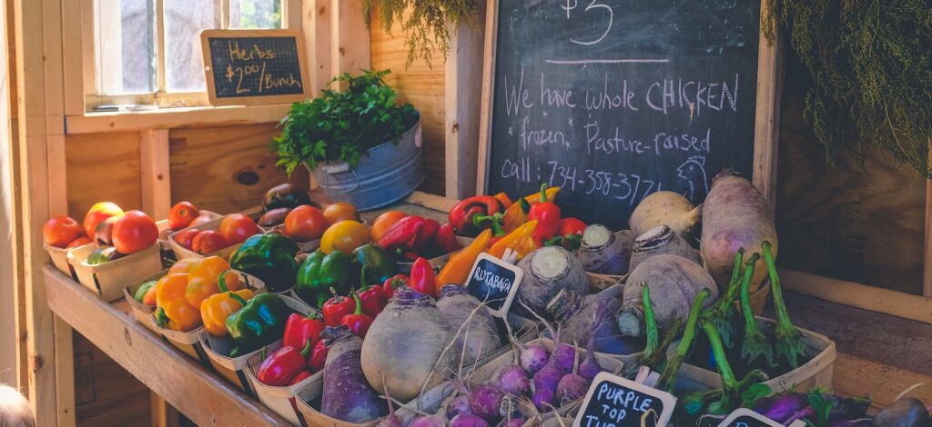 variety of vegetables display with Certified Organic signage