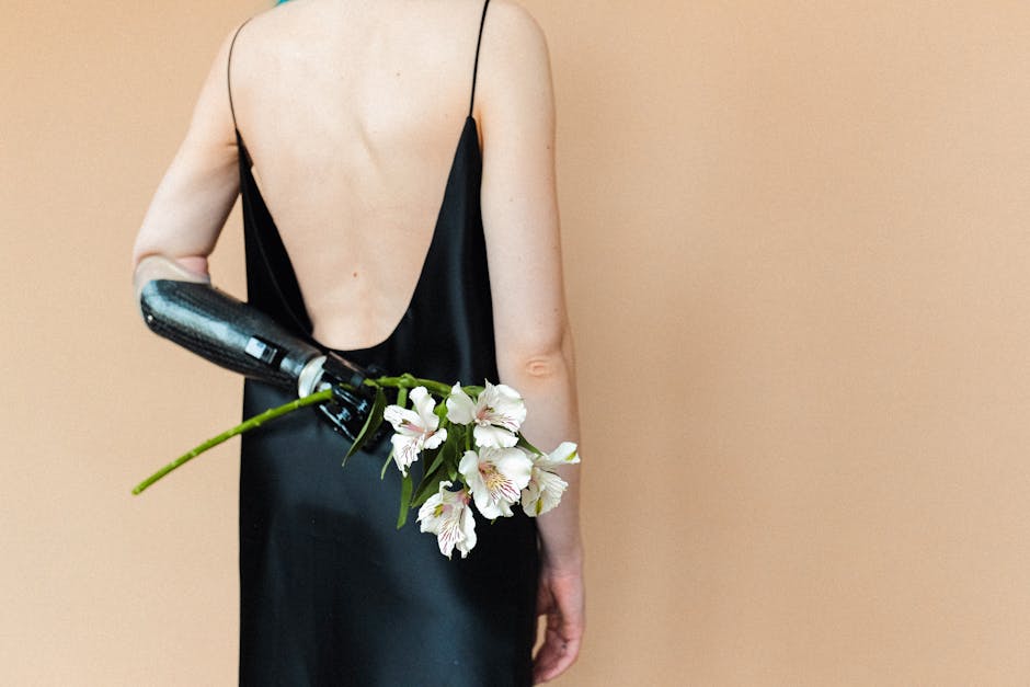 Black turtleneck layered under a red slip dress as creative fall layering pieces