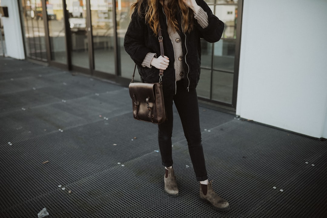 Winter footwear paired with layered knits and turtlenecks