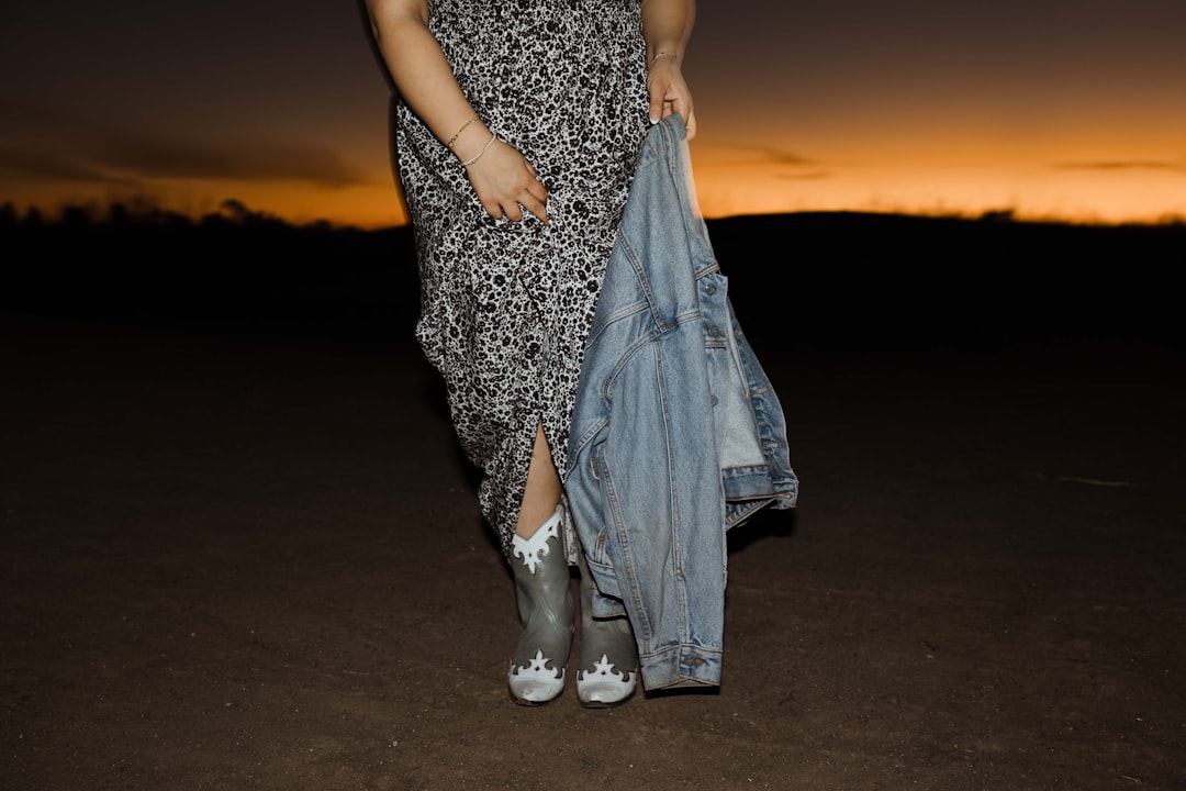 Alt text: Denim jacket as layering pieces over midi skirt for fall outfit