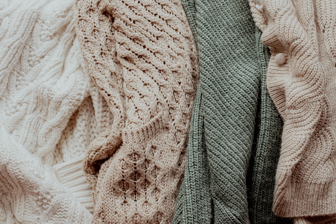Chunky knits and boots outfit ideas for fall sundresses