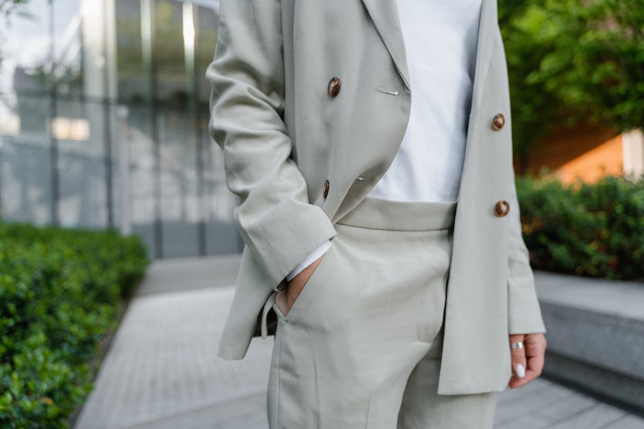 Alt text: Long blazer used as layering pieces with spring tee and pants