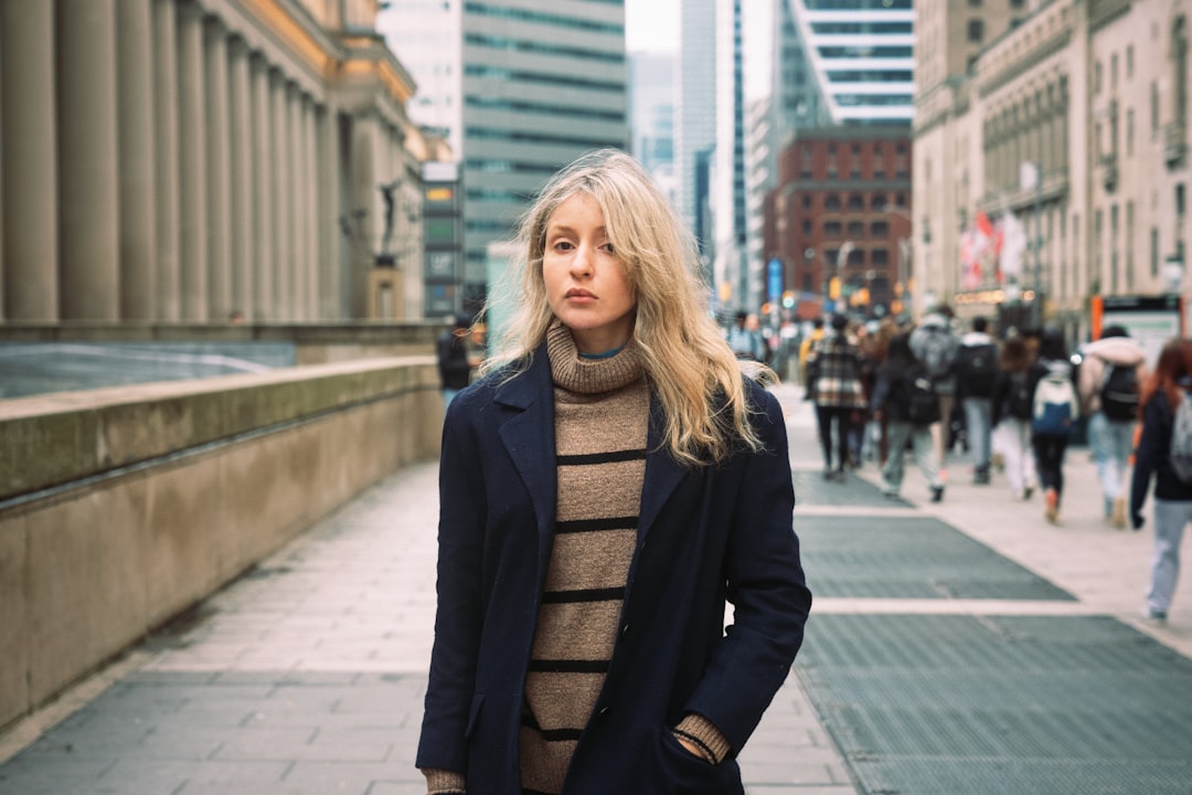 Woman demonstrating layered knits and turtlenecks outfit formula