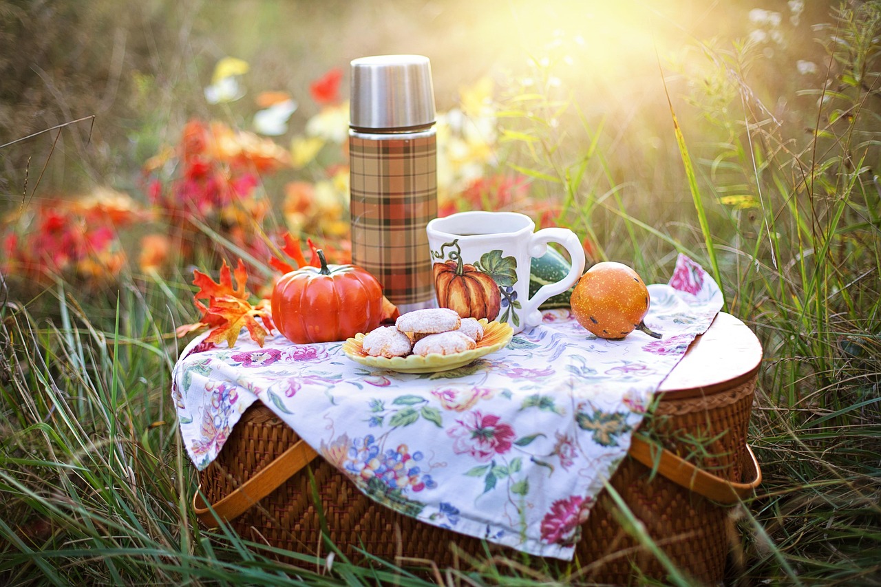 Alt text: large woven basket filled with fall throws in an entryway
